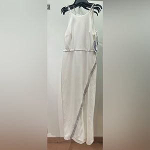 White dress with rhinestones on split